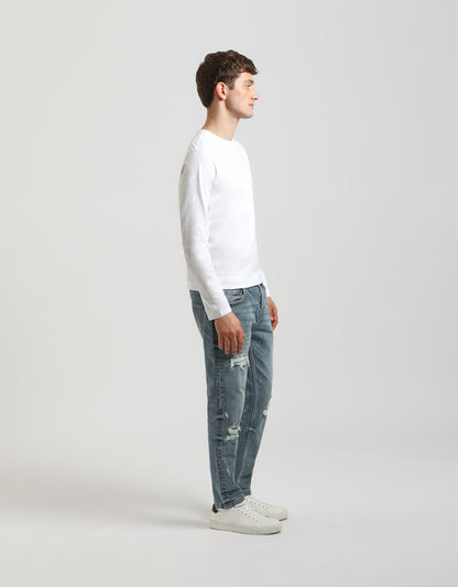 Jeans regular fit con strappi