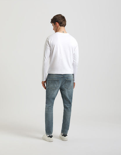 Jeans regular fit con strappi